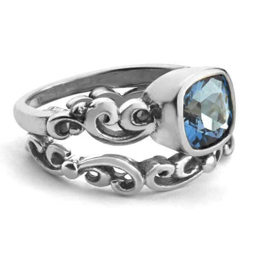 side view of aquamarine engagement ring set inspired by water and the ocean