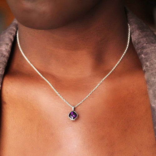 Sterling silver necklace with 7mm amethyst gemstone.