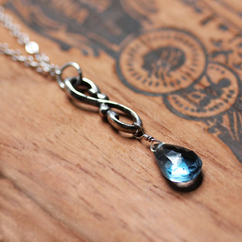 Wrought Swirl Infinity London Blue Topaz Necklace