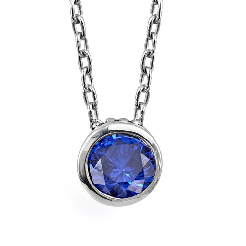 Sterling silver setting with imitation blue sapphire gemstones, slides along chain.