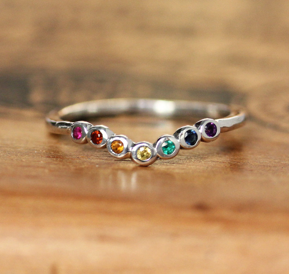 Sterling silver shadow ring with a small ruby, garnet, citrine, yellow sapphire, created emerald, blue sapphire, and amethyst gemstone.
